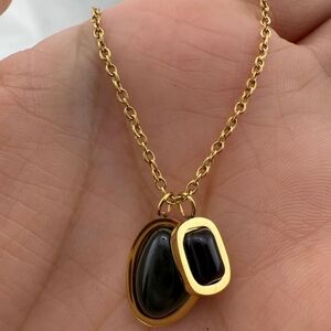 Anthropologie Elegant Gold and Black Pendant Necklace
